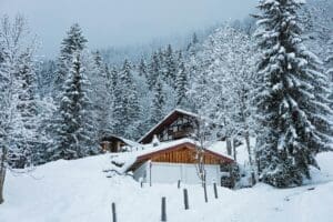 Snow-covered Reno home showing why hvac repair reno nv service matters during spring weather swings